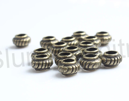 Kovový korálek - mezidíl 5,5 x 3,5 mm (AA226)