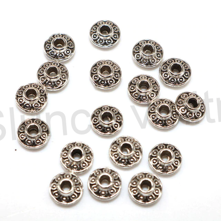 Kovový korálek - mezidíl 3,4 x 6,7 mm (AA227)