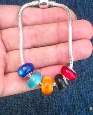 Korálek s velkým průvlekem kočičí oko, ulexit - červené (AC291)