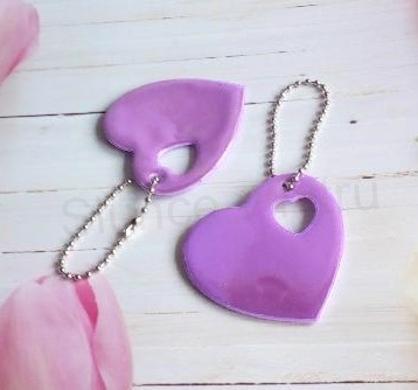 Klíčenka reflexní, fosforové srdce fialové (E893)