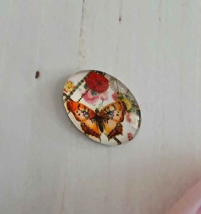 Kabošon skleněný ovál – motýl 25 × 18 × 6 mm (AD328)