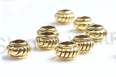 Kovový korálek - mezidíl 5,5 x 3,5 mm (AA224)