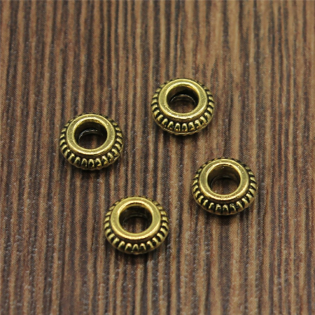 Kovový korálek - mezidíl 7 x 3 mm starožitné zlato (AA94