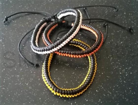 Kožený náramek nastavitelný pletený černo oranžový (BC499)