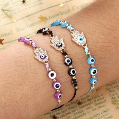 Šňůrkový náramek na ruku Swarovski elements ruka Fatimy - hamsa s okem světle růžový (BC582)