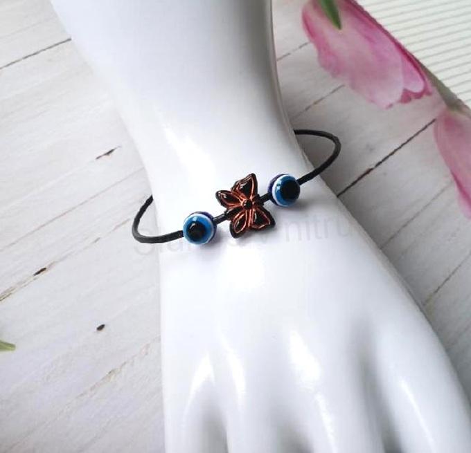 Kožený ozdobný náramek oko, motýl (BC590)