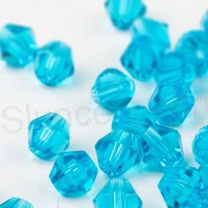 Korálky Swarovski Elements sluníčka 4 mm modré 10 kusů (AC60)
