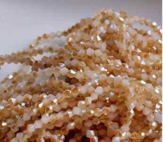 Korálky Swarovski Elements sluníčka 4 mm hnědé 10 kusů (AC62)