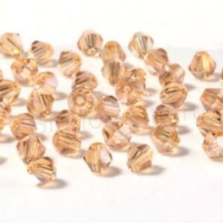 Korálky Swarovski Elements sluníčka, bicone | 4 mm hnědo růžové | 10 kusů (AC348)