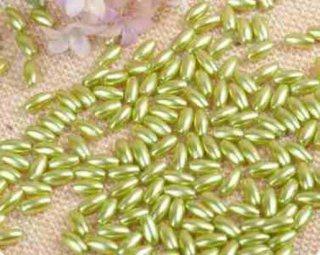 Plastové voskované oválné korálky zelené světlé (AC399)