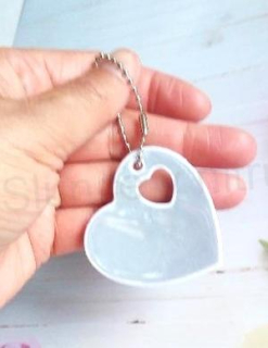 Klíčenka reflexní, fosforové srdce bílé (E888)