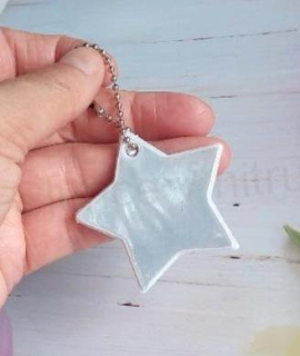 Klíčenka reflexní, fosforová hvězda bílá (E898)