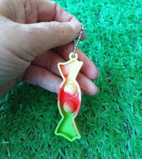 Klíčenka, přívěšek na klíče Fidget s Pop it Toys Bombon zelený (D1109)