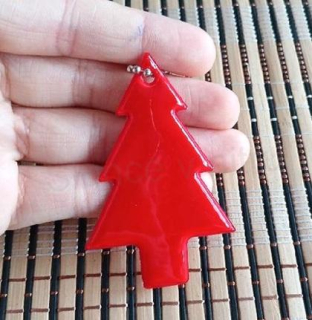 Klíčenka reflexní, fosforový stromek červený (E1055)