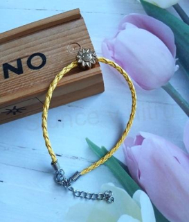 Splétaný náramek z umělé kůže a sluncem (BC686)