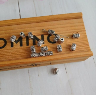 Slitinový korálek starožitný 7 × 5 mm (AA448)